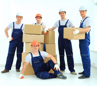 Van and helper supporting a Mayfair apartment relocation